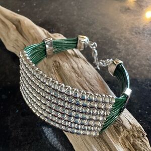 Stainless Steel Bracelet with Green Leather Cords – Statement Piece